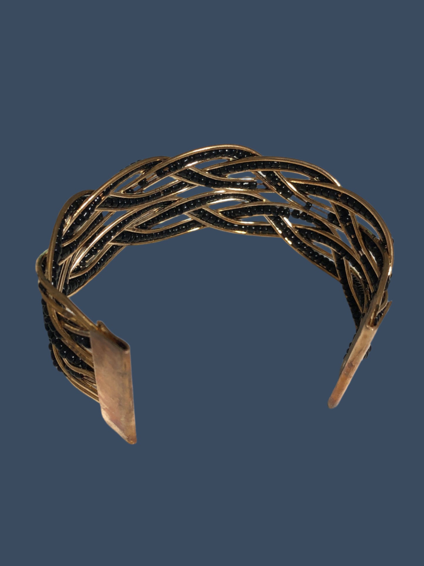 Gold Metal Bracelet with black beaded weaves