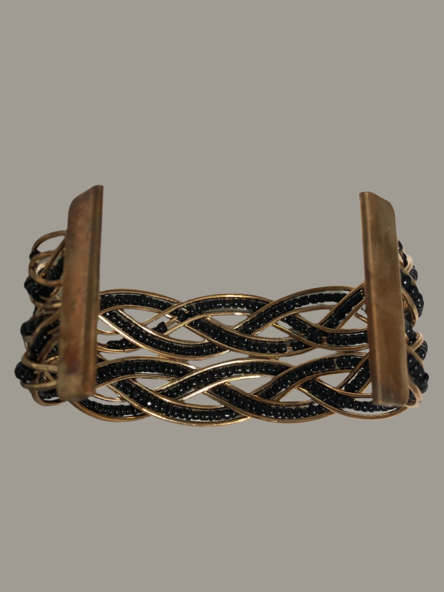 Gold Metal Bracelet with black beaded weaves